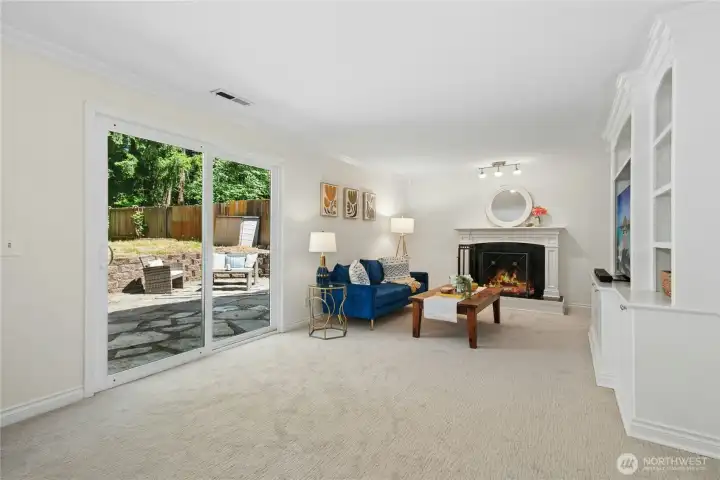 Cozy wood burning fireplace, with an entertainment center, perfect for movie night!