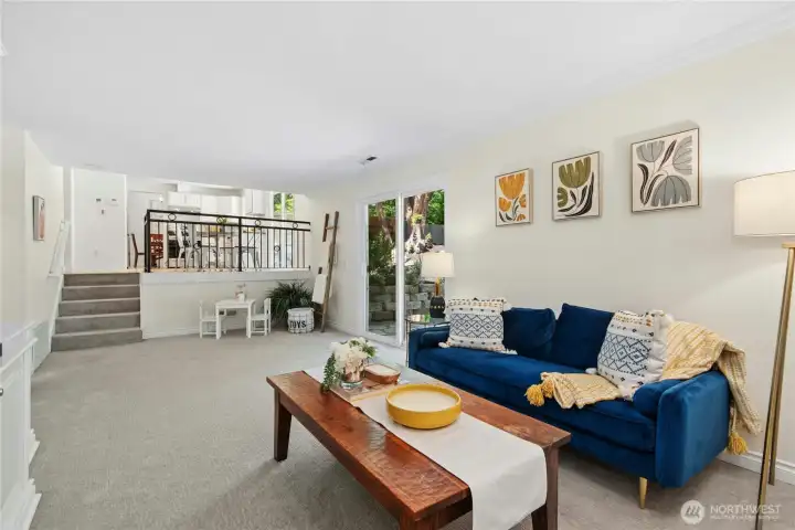 Lower level living room, with slider to lower patio.