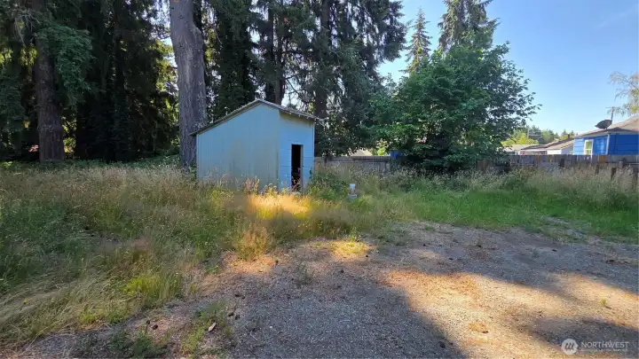 Detached outbuilding situated in the rear of the property, providing added functionality and storage space.  Rear outbui