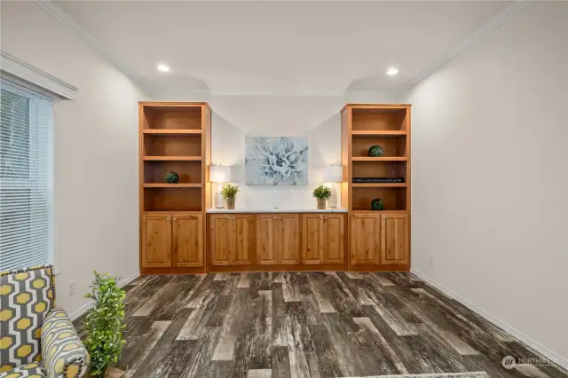 Built in knotty pine entertainment area.