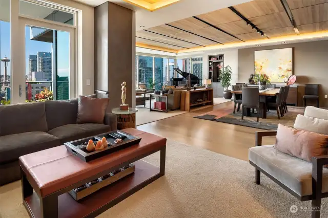 Formal Family Room with built-in entertainment center, shelves and drawers for storage. Entire home is wired for television, telephone and stereo system. Clear grain cedar ceiling, custom lighting and lovely views are added features in this room.