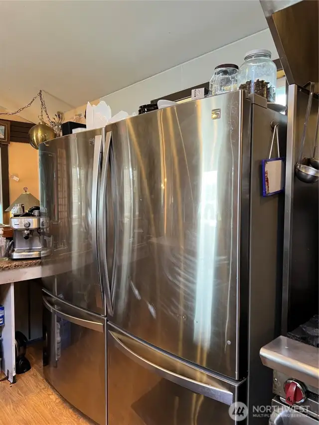 Two large refrigerators, all a part of the purchase of this restaurant.
