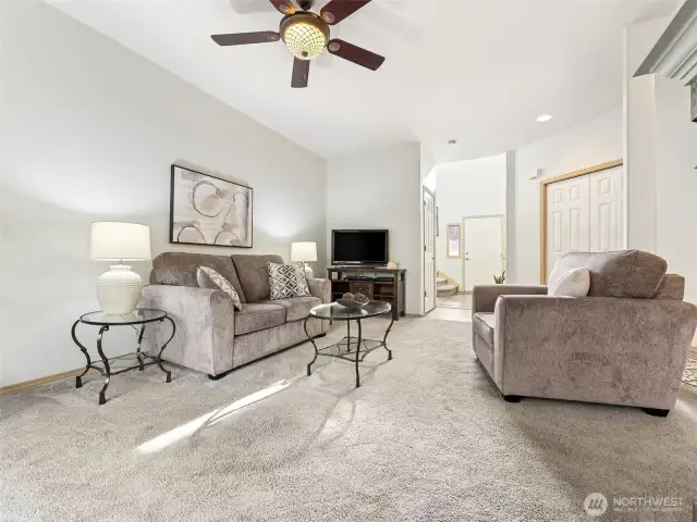 Newer flooring and fresh paint throughout! The ceiling fan will keep you cool - or warm, if you have your toasty fireplace on!