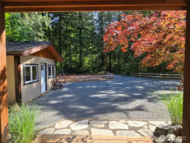 View of shed and driveway parking from the foyer/entry.