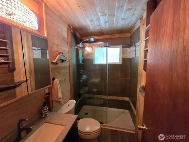 Cool custom bathroom with great tile shower.