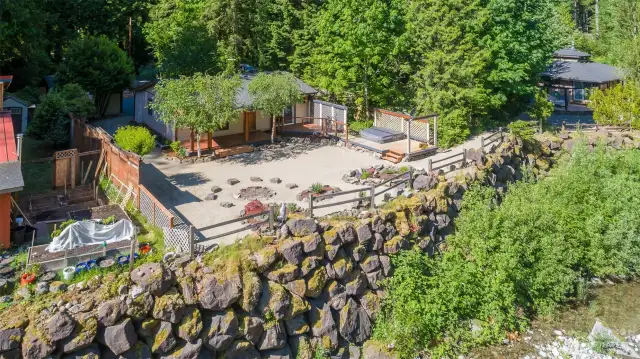 Protected by $500,000, massive retaining wall.