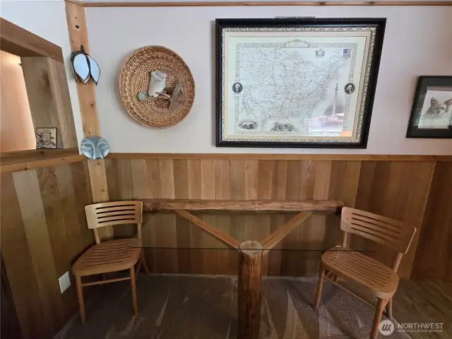 One of a kind, built-in glass top dining table.