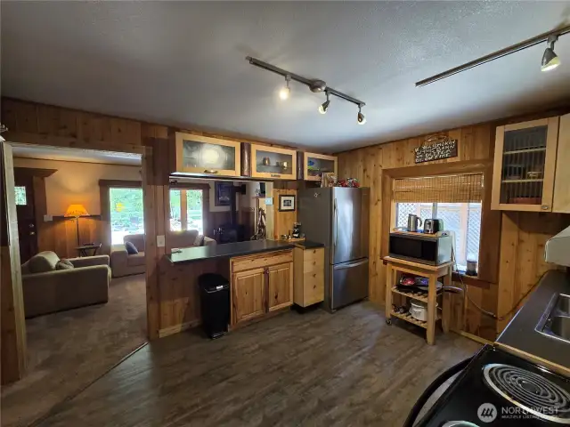 Your kitchen opens into your living and dining space, creating a great entertaining atmosphere. Kitchen also shares the view of the living/dining room as well.