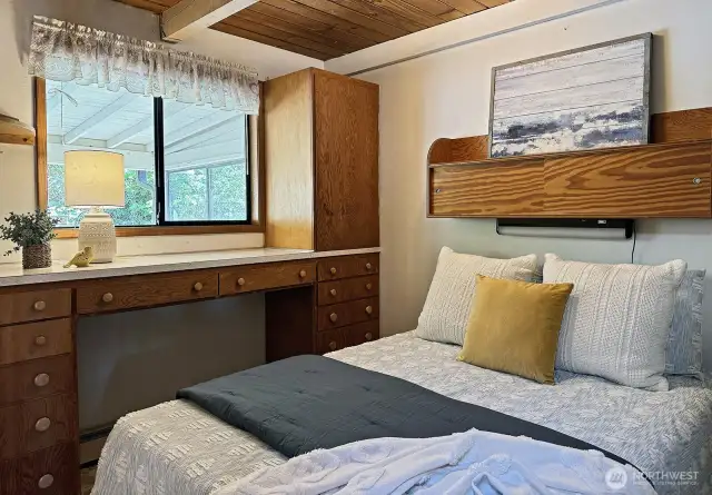 Main bedroom with built-ins.
