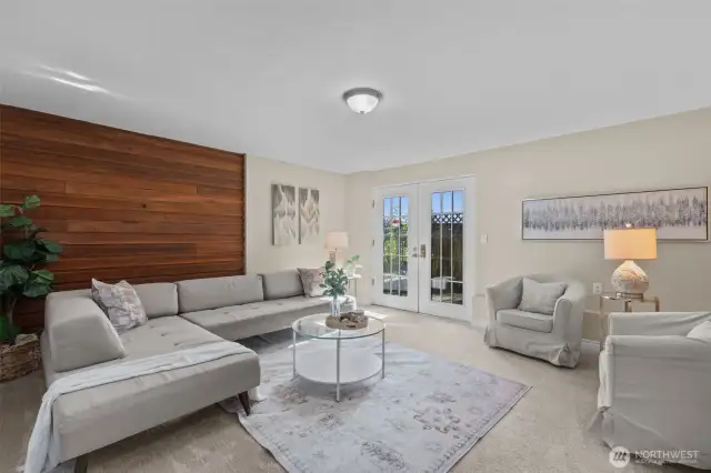 Basement bonus room, potential primary w/ French doors