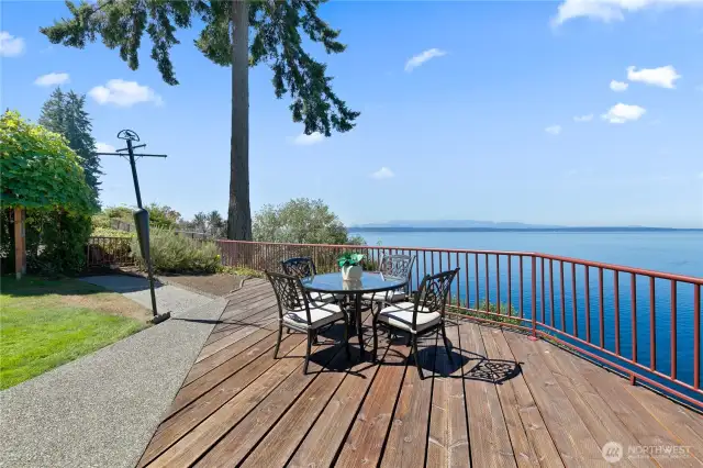 Wood patio has one of the best views with two ferries & Mt Baker