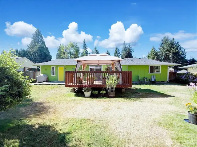 Huge, fully fenced, level backyard with 20' x 16' deck & gazebo.