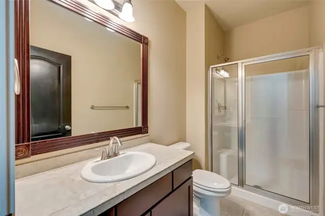 A 3/4 bathroom adds extra convenience for family and guests.