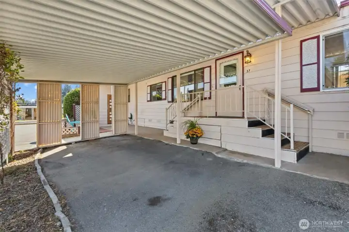 View of covered entry and stairs.