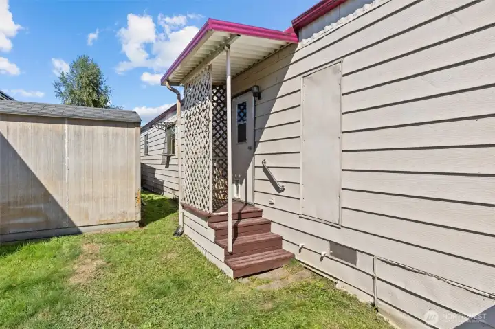 Additional door on back side of house.