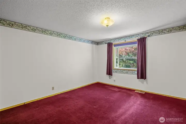 Generously Sized Bedroom with Plenty of Room to Relax