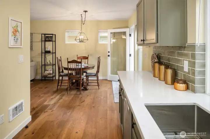 Kitchen with new countertops, back splash, and appliances