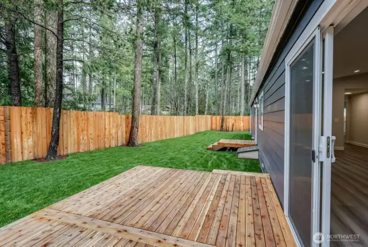 Back deck with fully fenced yard