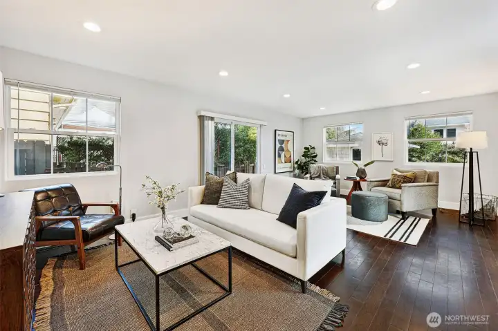 Just off the kitchen, a spacious rec room offers exceptional flexibility—perfect for additional dining, a playroom, home office or media lounge.