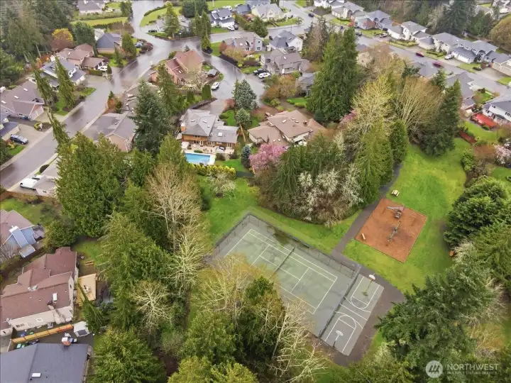 Aerial view showing the home’s proximity to the community park with direct access from the backyard.