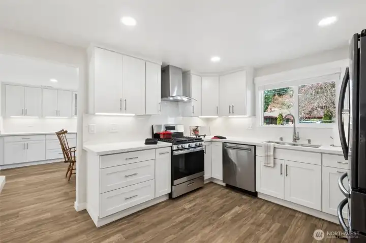 Kitchen with Gas Stove and under cabinet lighting.