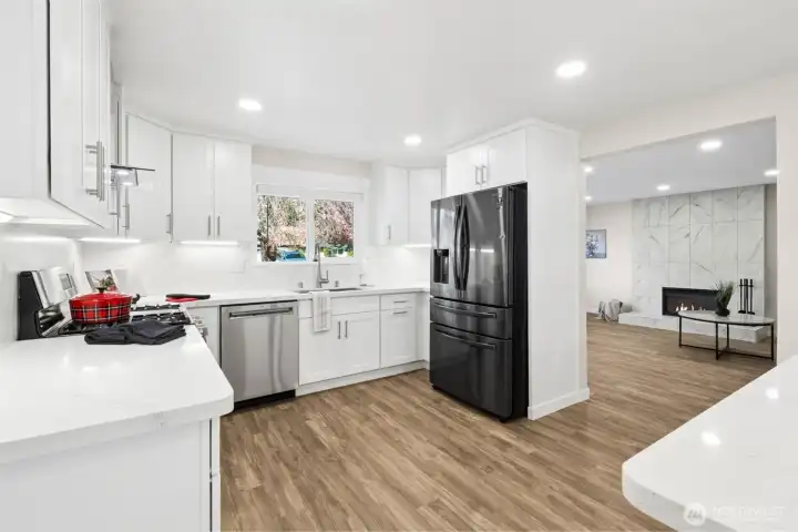 Kitchen facing Living Room and Electric Fireplace (Fireplace tile edited in and now finished)