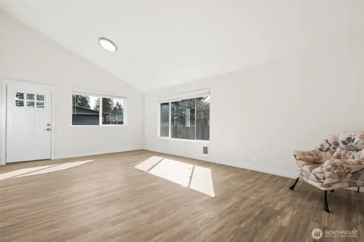 Vaulted Rec Room off Dining Room on the way to the Back Yard.