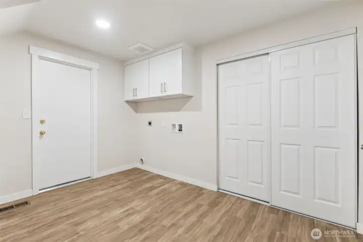 Laundry Room off Main Hallway - Door to Garage