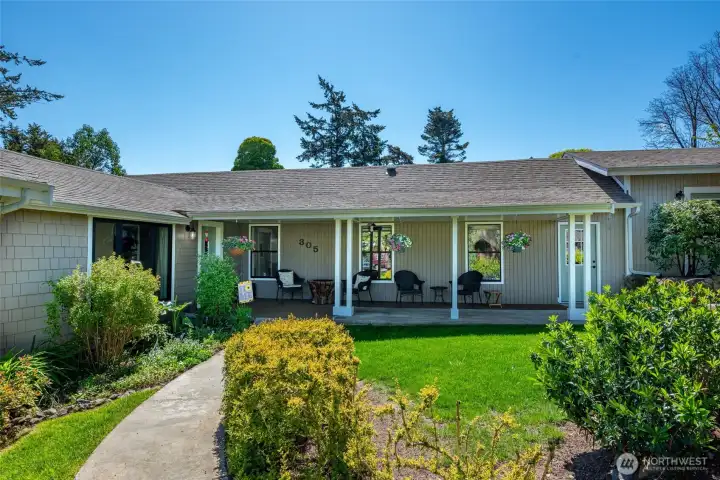 Welcoming covered front porch, perfect for entertaining and enjoying the beautiful view!