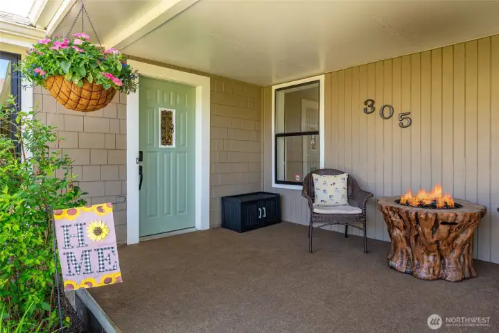 Custom front door and lovely covered entryway allow for a lovely and welcoming atmosphere!