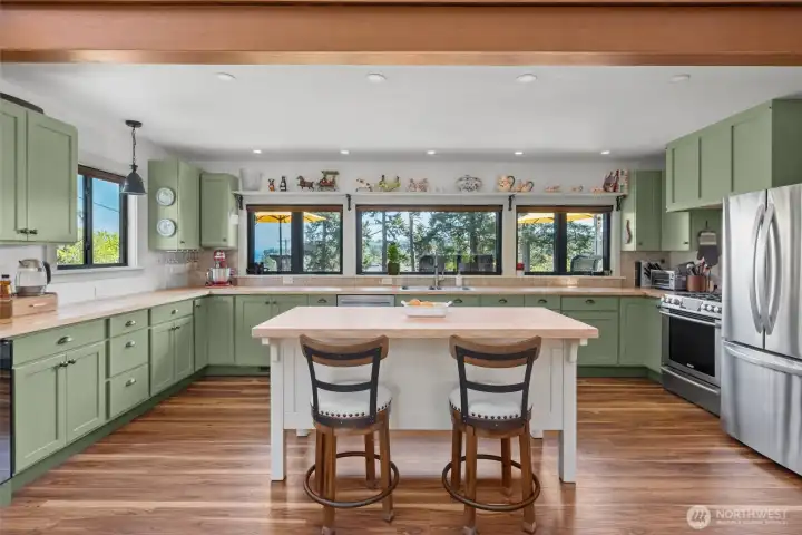 Fabulous kitchen, boasts gorgeous wood countertops and plenty of cabinet space.