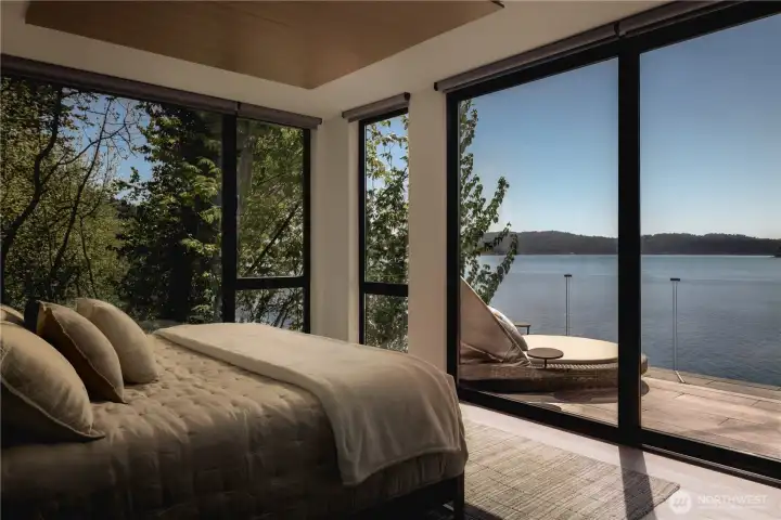 The primary suite is composed with intention, where light, material, and outlook come together naturally.
