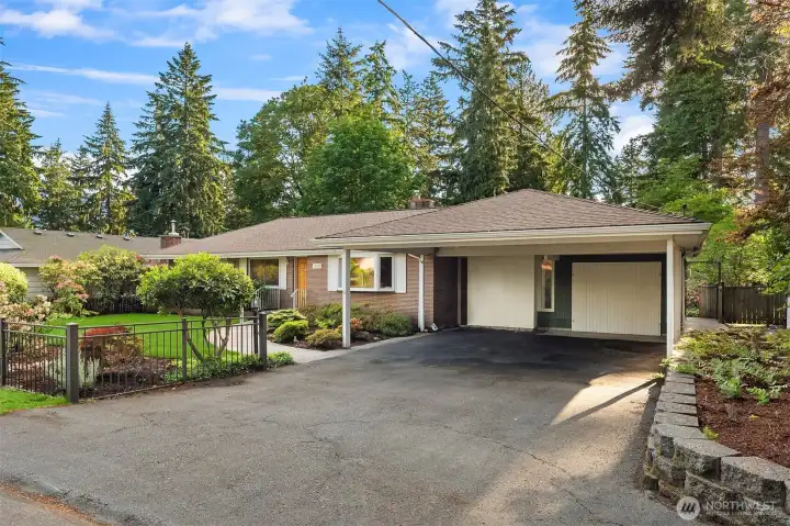 Carport with 2 covered spaces and room for plenty more in the driveway. Carport with 2 covered spaces and room for plenty more in the driveway.