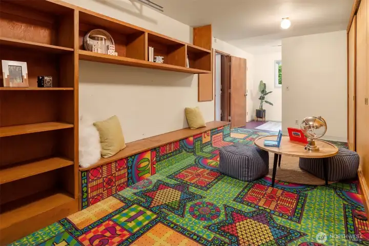 The "Hopscotch" room is off the sunken room and was once a garage. This space could be turned back into a garage or keep it as a playroom and play checkers and hopscotch whenever the mood strikes you! The "Hopscotch" room is off the sunken room and was once a garage. This space could be turned back into a garage or keep it as a playroom and play checkers and hopscotch whenever the mood strikes you!