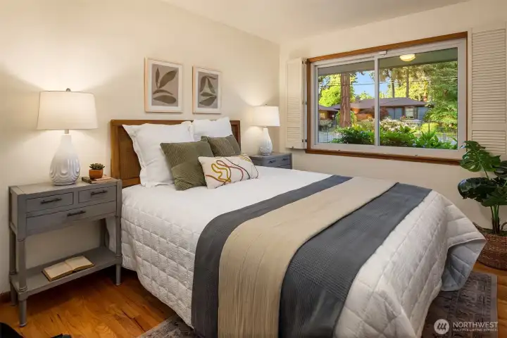 One of three bedrooms, all with hard wood floors. One of three bedrooms, all with hard wood floors.