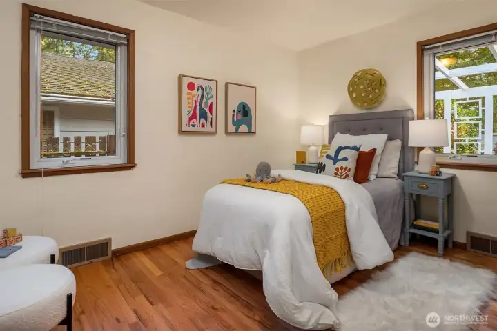 Third of three bedrooms with hard wood floors. Third of three bedrooms with hard wood floors.