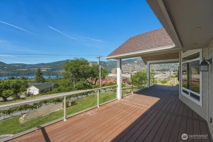 Expansive view deck designed for outdoor entertaining, dining, and unforgettable Lake Chelan sunsets. Expansive view deck designed for outdoor entertaining, dining, and unforgettable Lake Chelan sunsets.