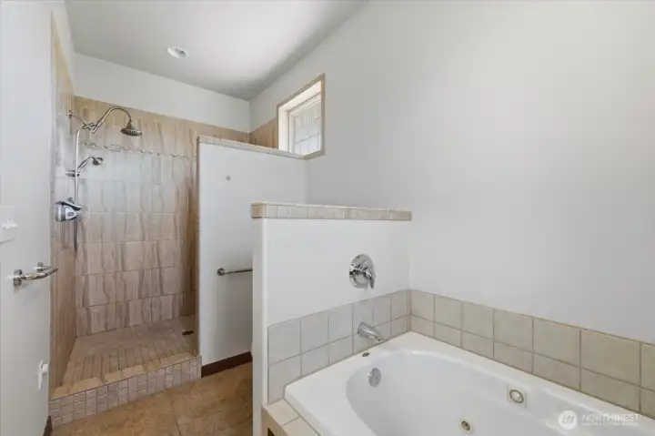 Well-appointed primary bath offering comfort and convenience within the private owner's retreat. Well-appointed primary bath offering comfort and convenience within the private owner's retreat.