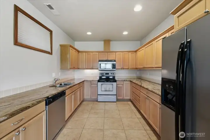 Full second kitchen creates exceptional flexibility rarely found in today's market. Full second kitchen creates exceptional flexibility rarely found in today's market.