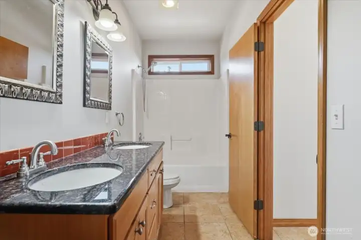 Additional full bath enhances convenience for guests, family members, and lower-level living. Additional full bath enhances convenience for guests, family members, and lower-level living.
