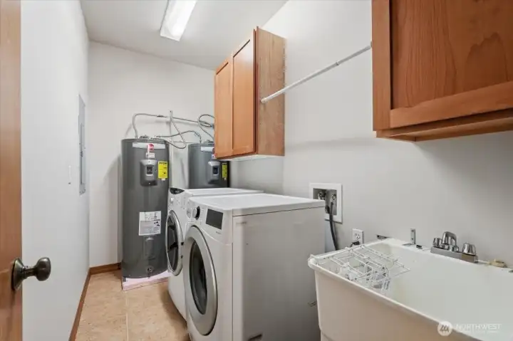 Dedicated lower-level utility room provides added convenience and flexibility for guests, extended family, or multi-generational living. Dedicated lower-level utility room provides added convenience and flexibility for guests, extended family, or multi-generational living.