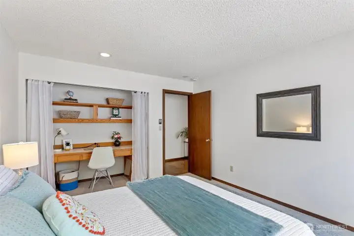 A clever use of space with a built-in office nook and shelving for those who work from home.