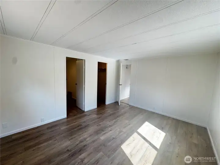 Primary Bedroom with walk in closet and private bathroom. Primary Bedroom with walk in closet and private bathroom.