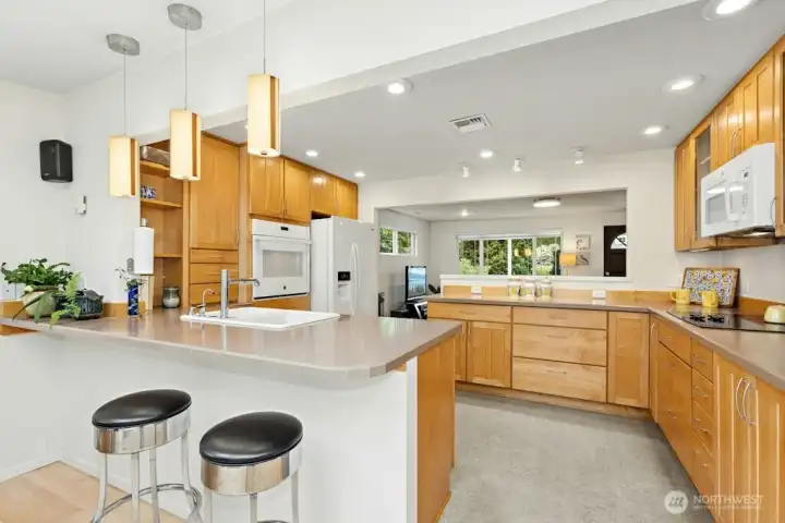 Beautiful maple cabinetry in the gourmet kitchen