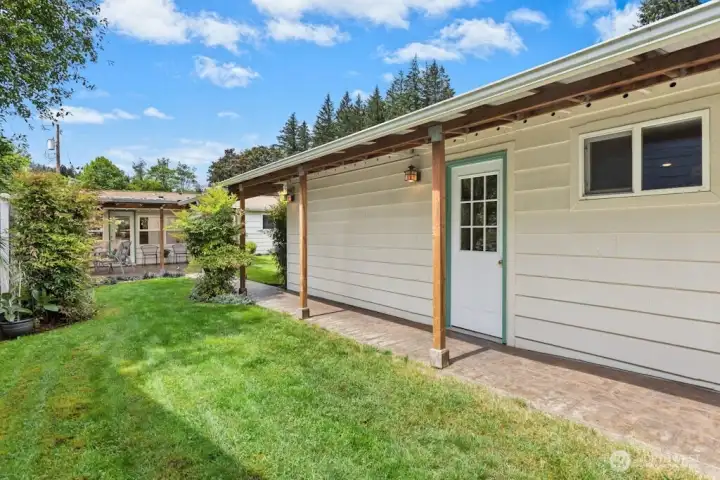 The large outbuilding provides lots of storage too!
