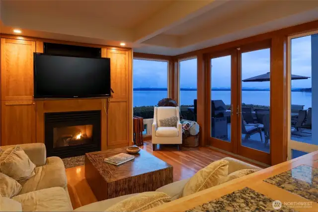 Watch the sunset by the fireplace