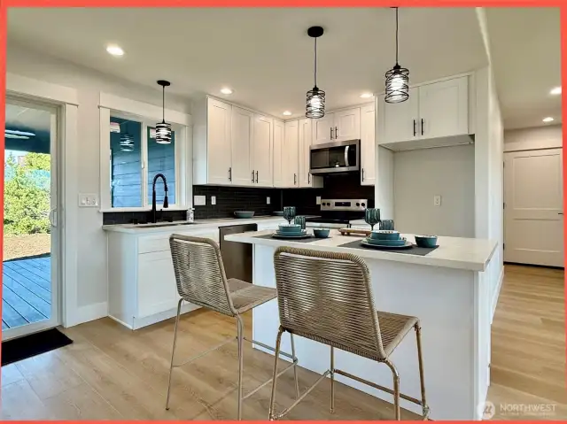 Kitchen with plenty of prep/storage space.