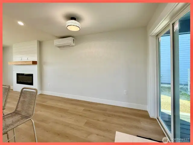 Dining area with door leading to the covered Trex deck