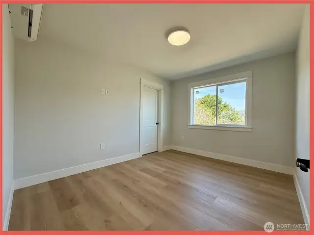 Second bedroom across the hallway from the guest bathroom.