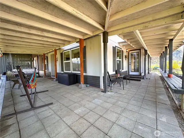Covered wrap around porch is 456sf with surrounding bench seating providing great shade areas from afternoon sun
